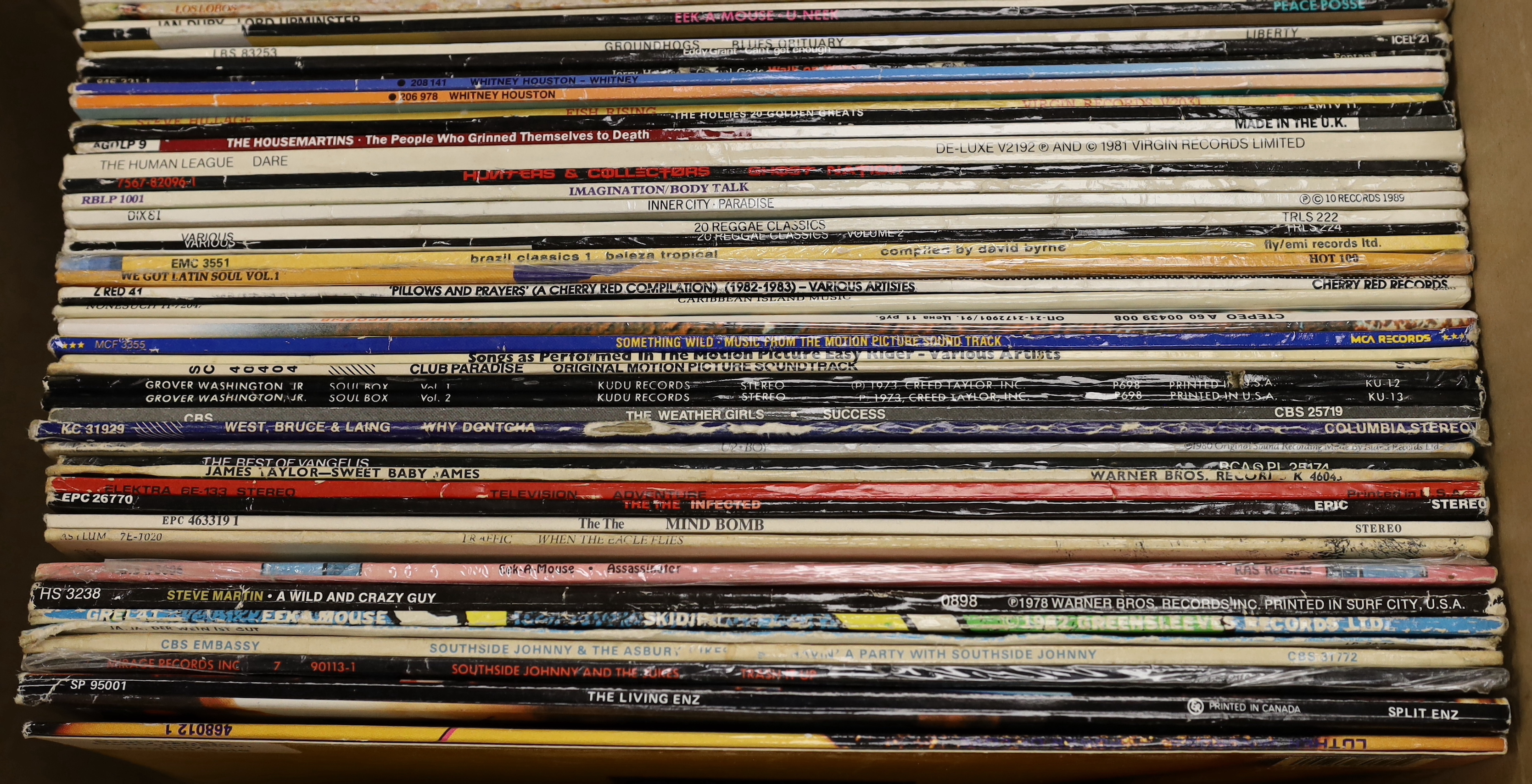 A collection of mostly 1970's/80's LPs together with a few 12 inch singles, including The Specials; Ghost Town, Frankie goes to Hollywood; Relax, Tom Jones, Ry Cooder, Phil Collins, Diana Ross, Simon & Garfunkel, Nat Kin